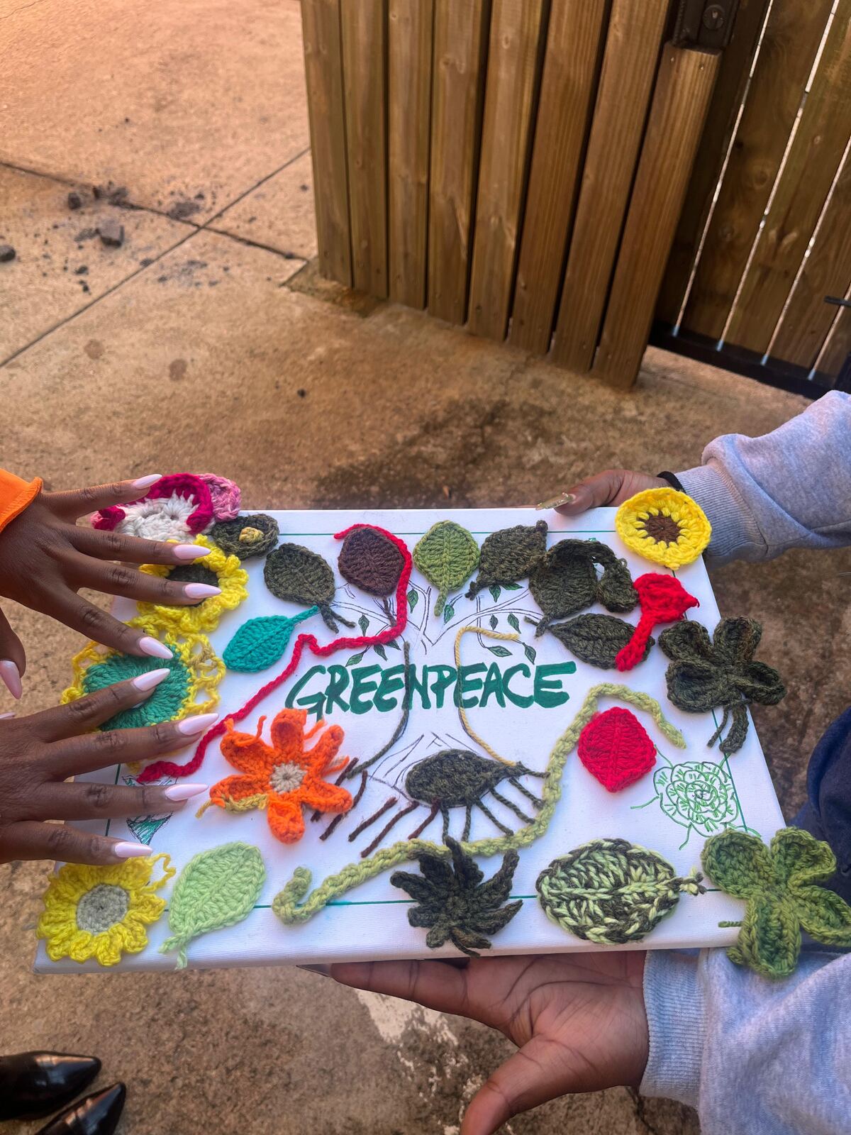 Close-up of the crocheted mural made with Greenpeace Africa volunteers