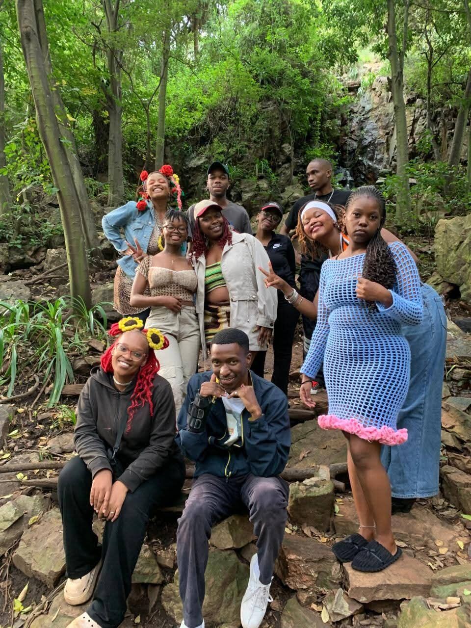 Group photo from the second crochet picnic in a forest park